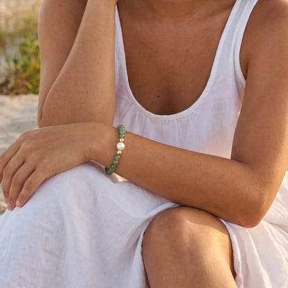 Green aventurine, pearl and initial gold bracelet featuring polished green gemstone beads, lustrous freshwater pearls and a personalised gold-filled stamped initial disc.
