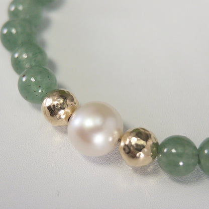 Green aventurine, pearl and initial gold bracelet featuring polished green gemstone beads, lustrous freshwater pearls and a personalised gold-filled stamped initial disc.