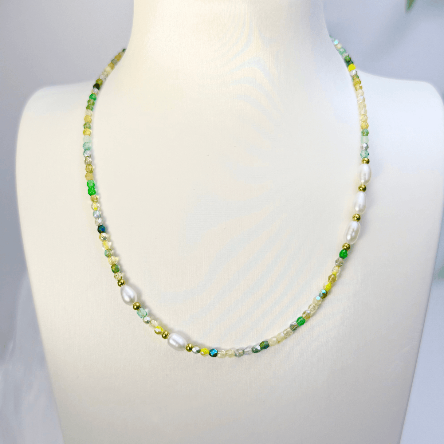 Handmade necklace with 3mm green Czech glass beads and freshwater pearls, finished with gold or silver findings.