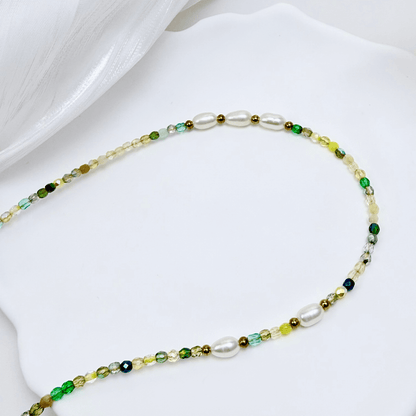 Handmade necklace with 3mm green Czech glass beads and freshwater pearls, finished with gold or silver findings.