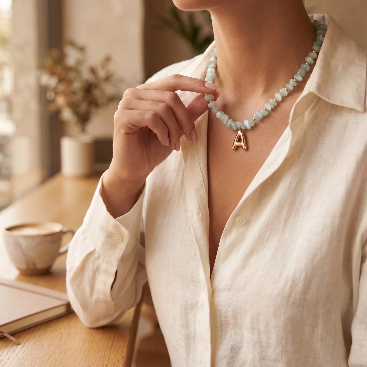 MXW Jewellery Green moonstone beaded necklace with a 14K gold filled bubble initial pendant.
