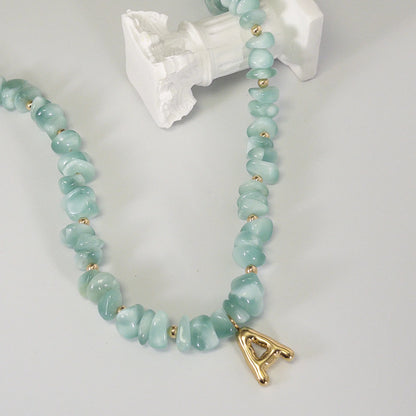 MXW Jewellery Green moonstone beaded necklace with a 14K gold filled bubble initial pendant.