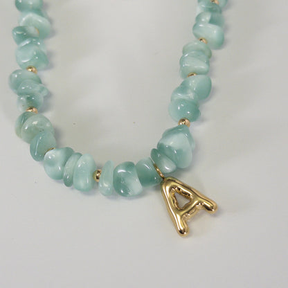 MXW Jewellery Green moonstone beaded necklace with a 14K gold filled bubble initial pendant.
