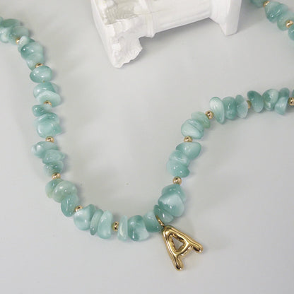 MXW Jewellery Green moonstone beaded necklace with a 14K gold filled bubble initial pendant.