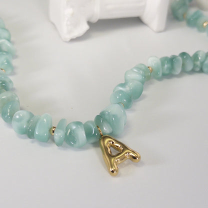 MXW Jewellery Green moonstone beaded necklace with a 14K gold filled bubble initial pendant.
