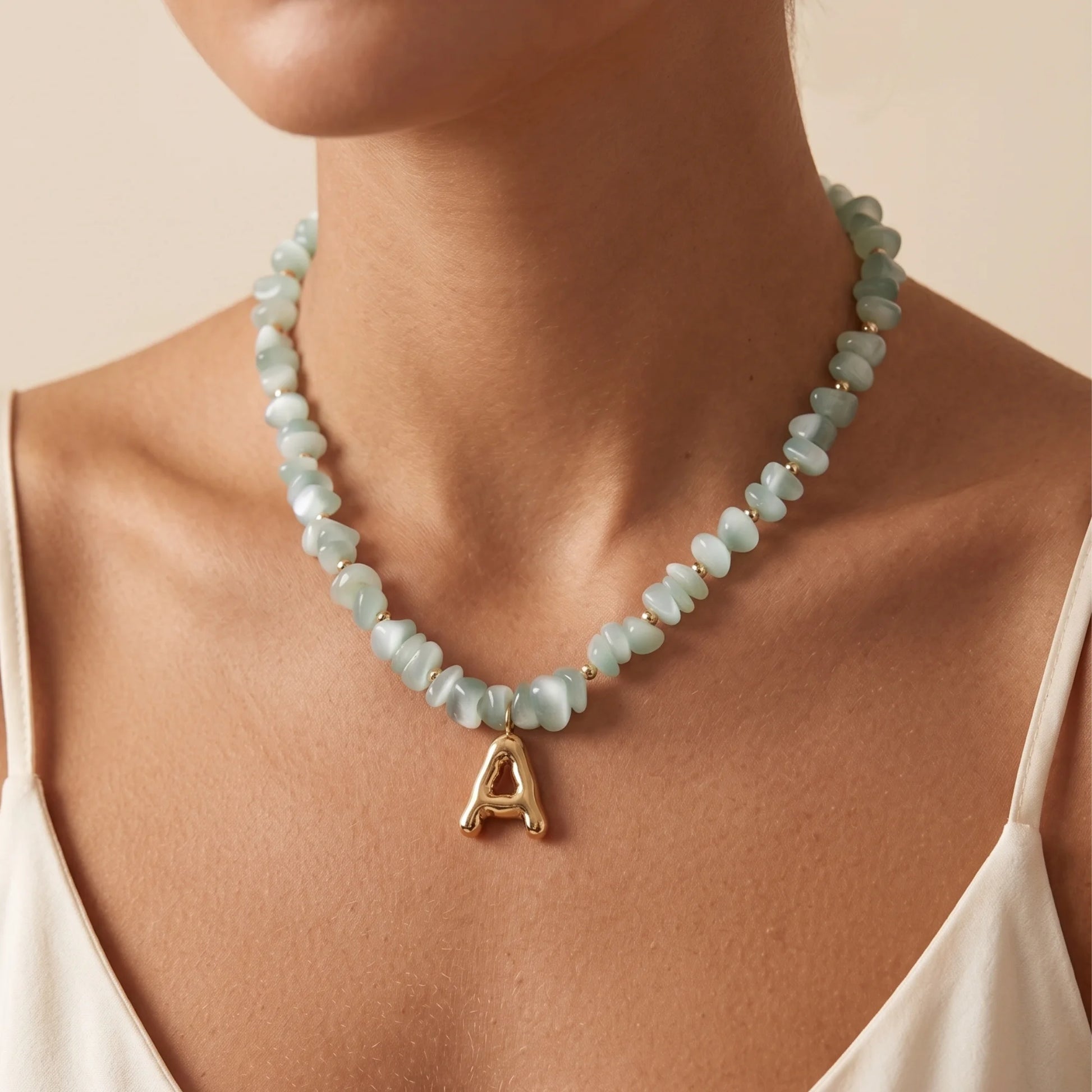 MXW Jewellery Green moonstone beaded necklace with a 14K gold filled bubble initial pendant.