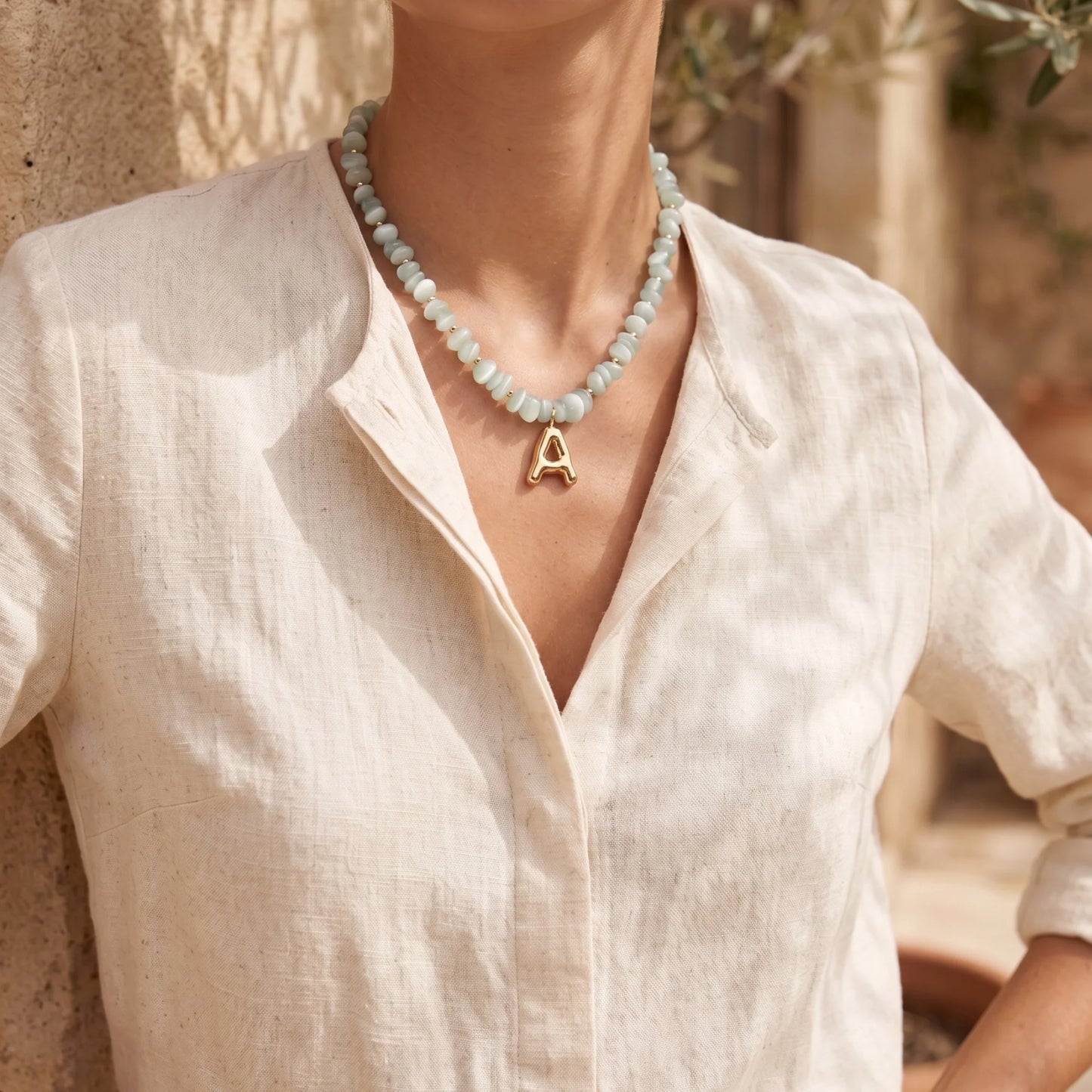 MXW Jewellery Green moonstone beaded necklace with a 14K gold filled bubble initial pendant.