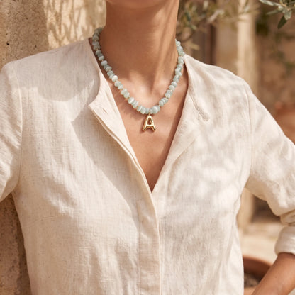 MXW Jewellery Green moonstone beaded necklace with a 14K gold filled bubble initial pendant.