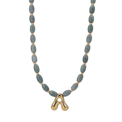 Guatemalan jade initial necklace with smooth barrel beads, 14K gold filled spacers and a bubble letter pendant