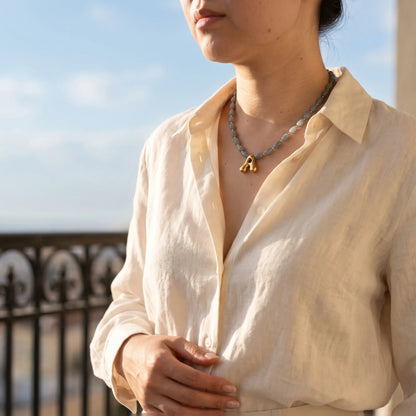 Guatemalan jade initial necklace with smooth barrel beads, 14K gold filled spacers and a bubble letter pendant