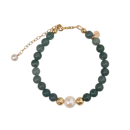 Guatemalan jade, pearl and initial gold bracelet featuring premium blue green Guatemalan jade beads, lustrous pearls and a personalised gold-filled stamped initial disc.