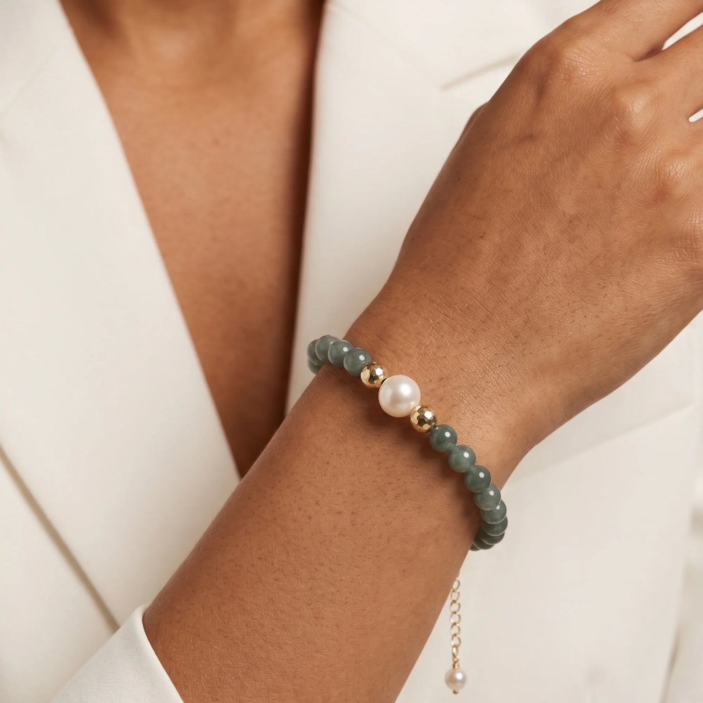Guatemalan jade, pearl and initial gold bracelet featuring premium blue green Guatemalan jade beads, lustrous pearls and a personalised gold-filled stamped initial disc.