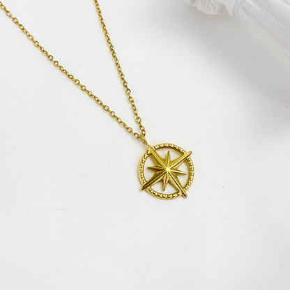 Gold compass necklace symbolising guidance and meaning – MXW Jewellery