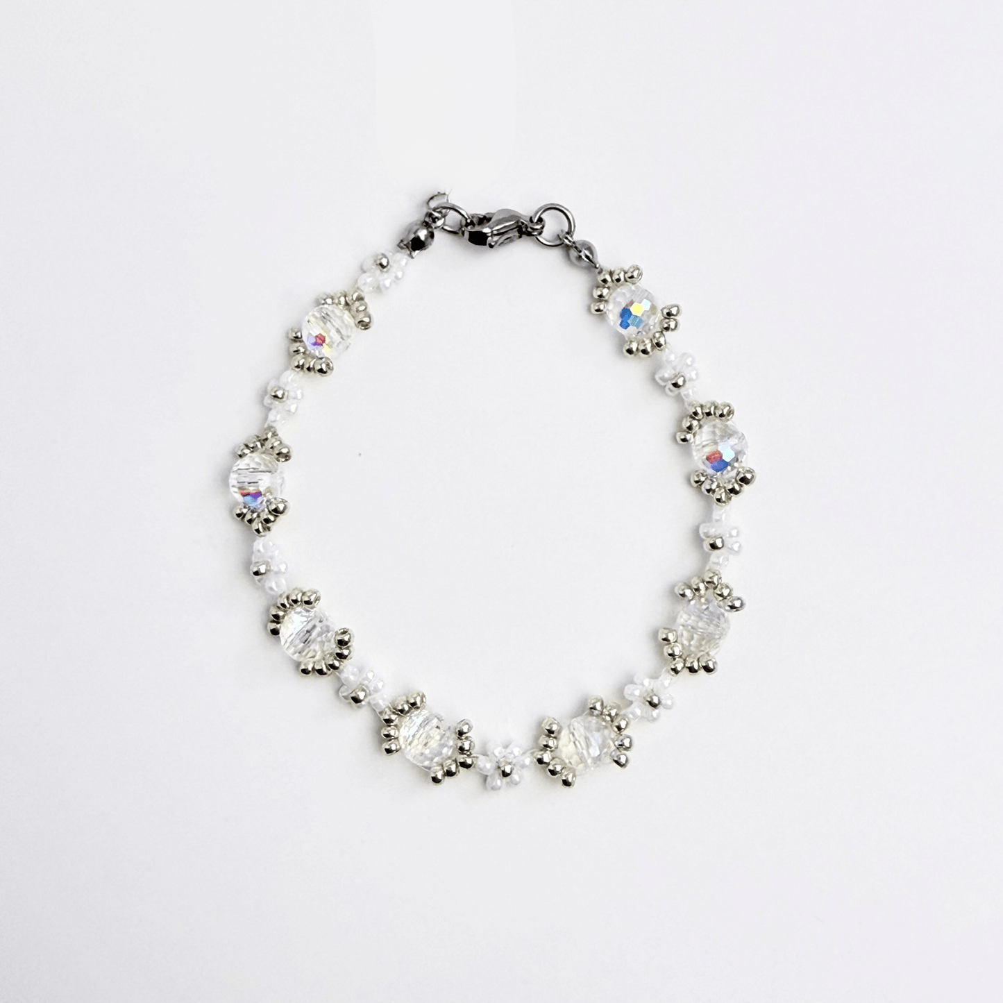 Handmade clear crystal beaded flower bracelet with iridescent Japanese glass beads in gold or silver finish
