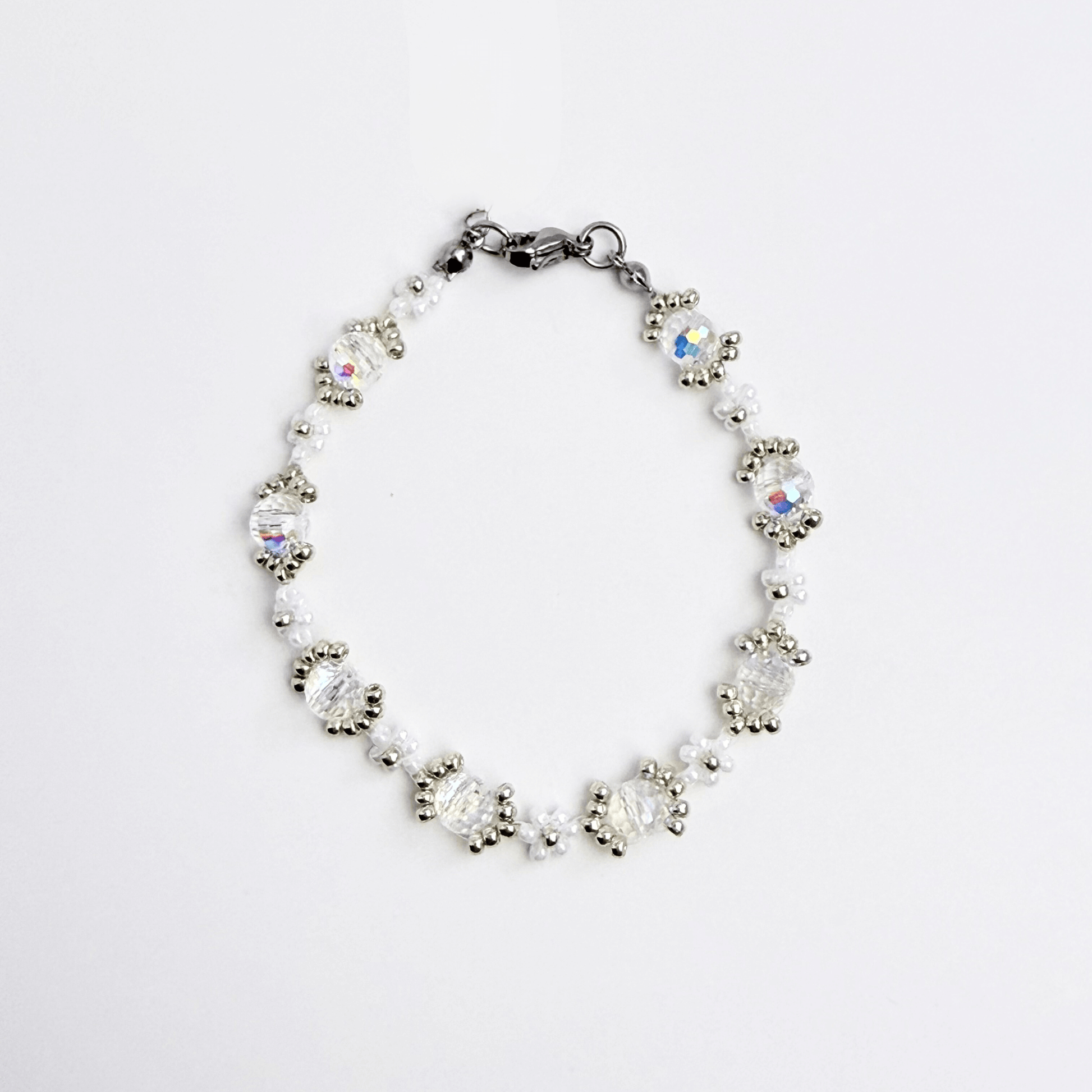 Handmade clear crystal beaded flower bracelet with iridescent Japanese glass beads in gold or silver finish