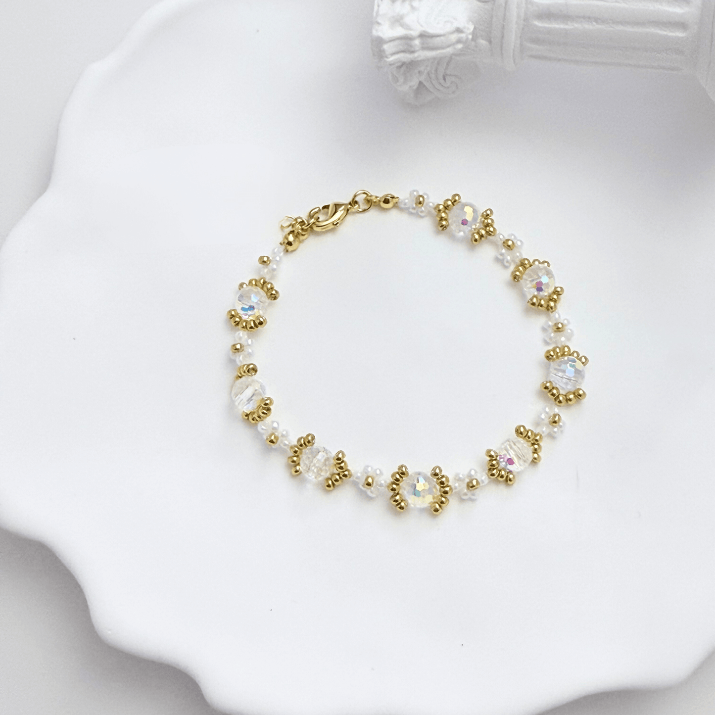 Handmade clear crystal beaded flower bracelet with iridescent Japanese glass beads in gold or silver finish