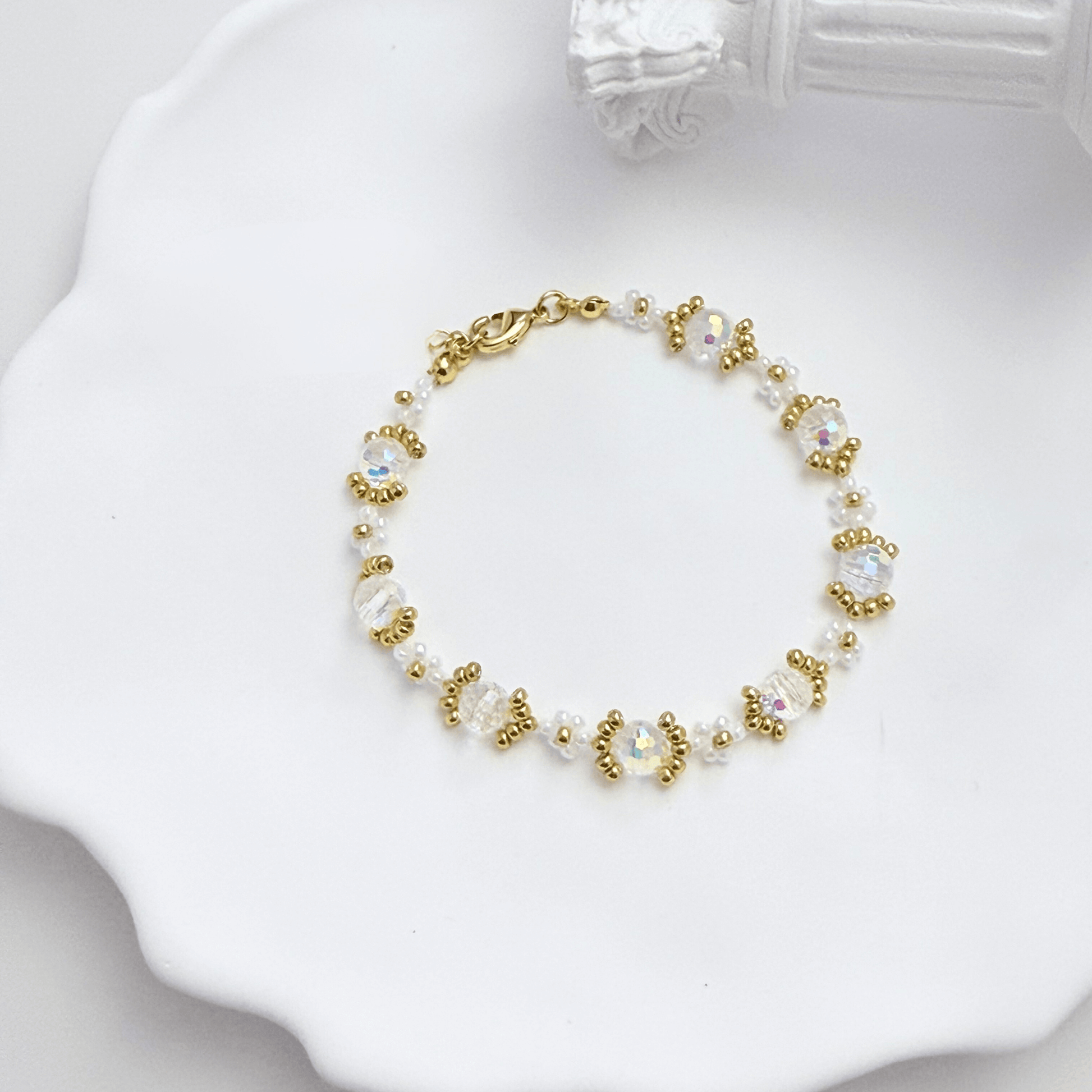 Handmade clear crystal beaded flower bracelet with iridescent Japanese glass beads in gold or silver finish