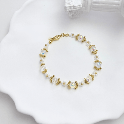 Handmade clear crystal beaded flower bracelet with iridescent Japanese glass beads in gold or silver finish