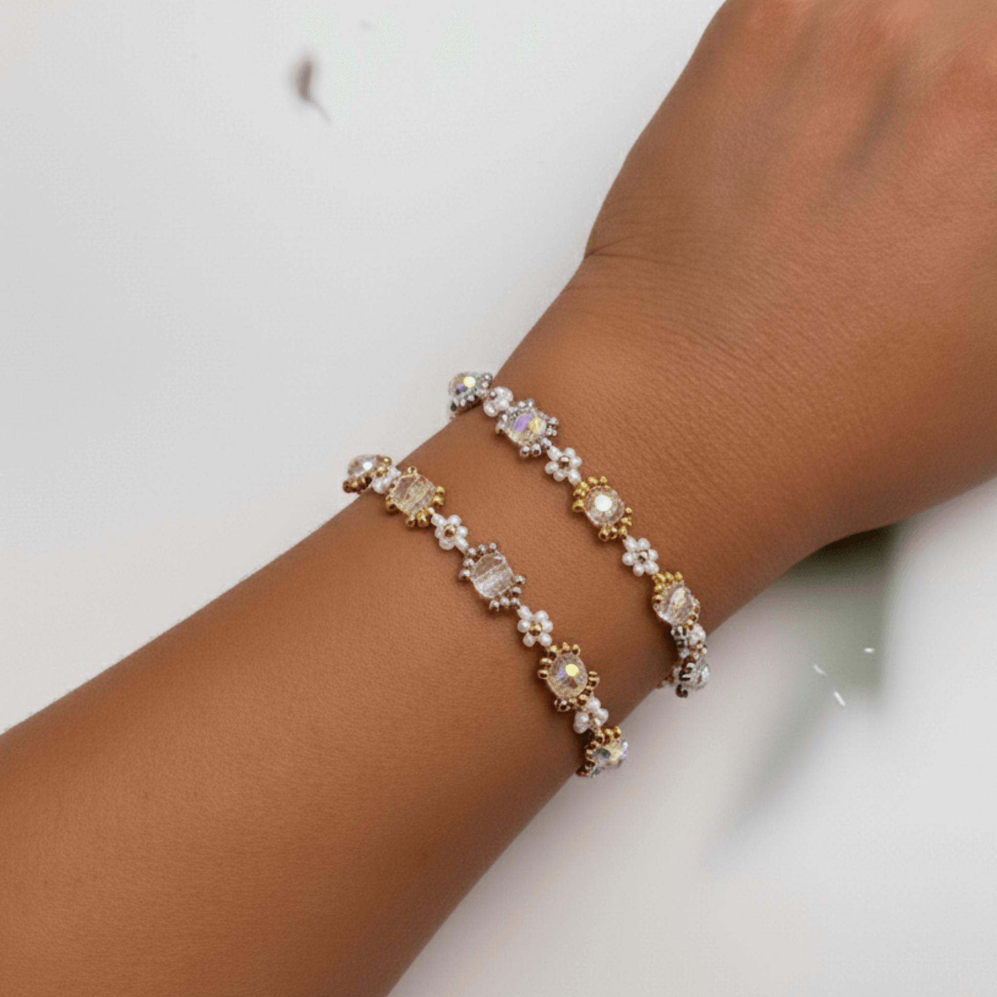 Handmade clear crystal beaded flower bracelet with iridescent Japanese glass beads in gold or silver finish