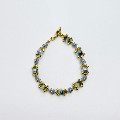 Handmade blue-grey beaded flower bracelet with Japanese glass beads and gold or silver accents