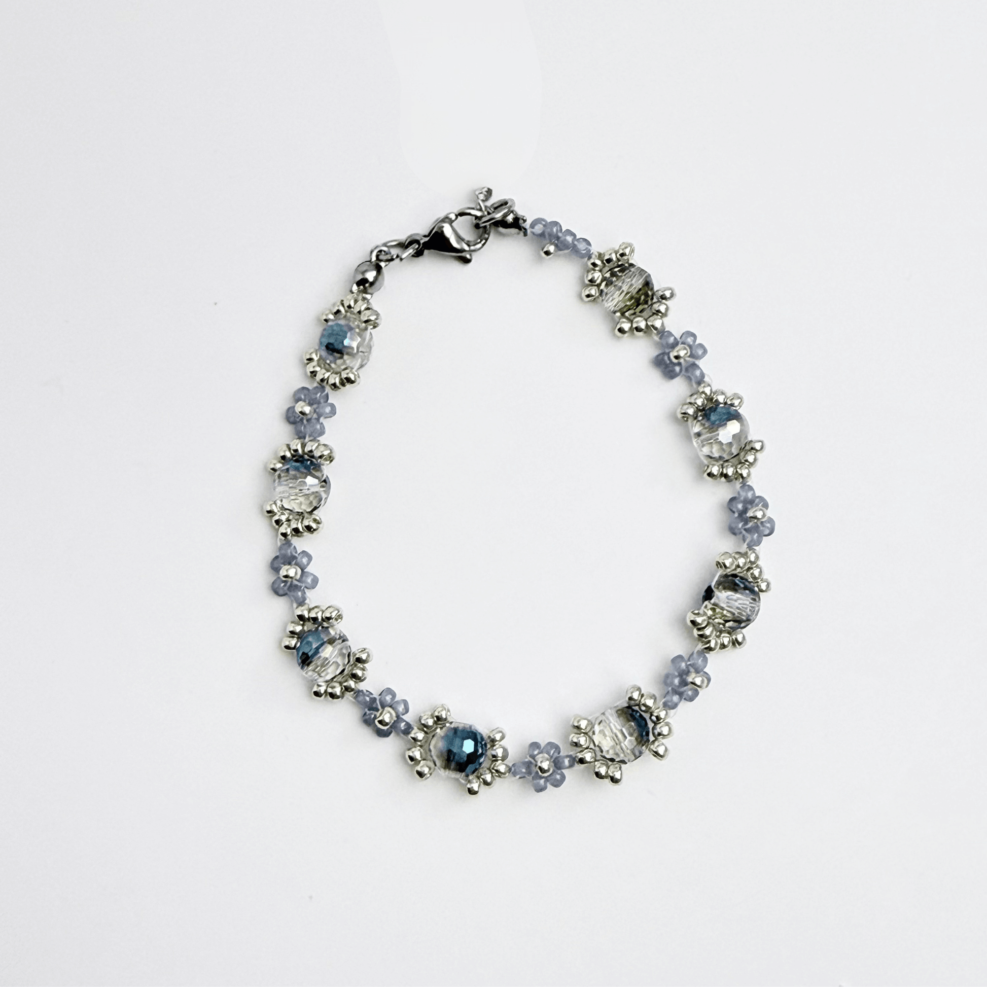 Handmade blue-grey beaded flower bracelet with Japanese glass beads and gold or silver accents