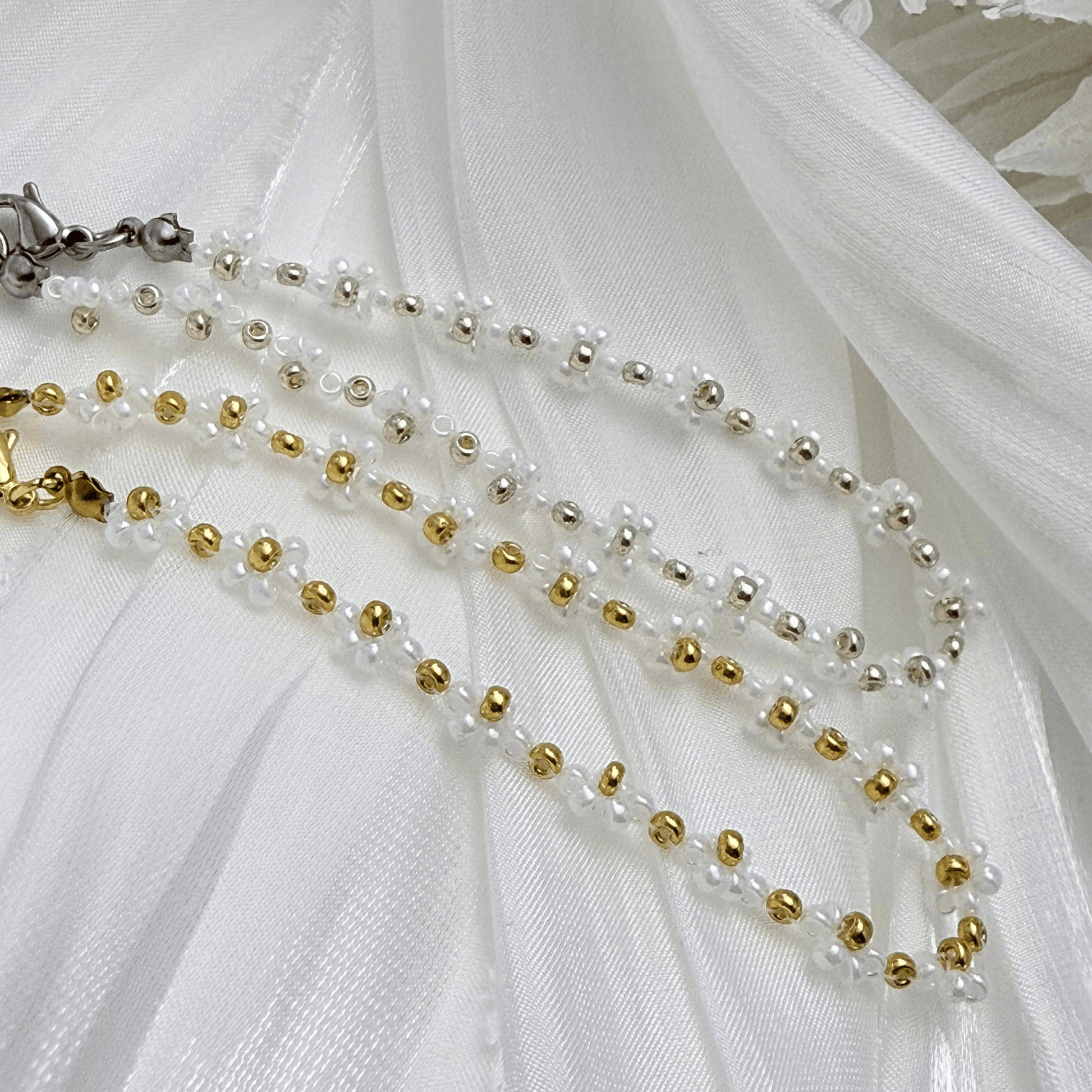 Handmade white daisy flower beaded bracelet with Japanese 2 mm seed beads and gold or silver accents