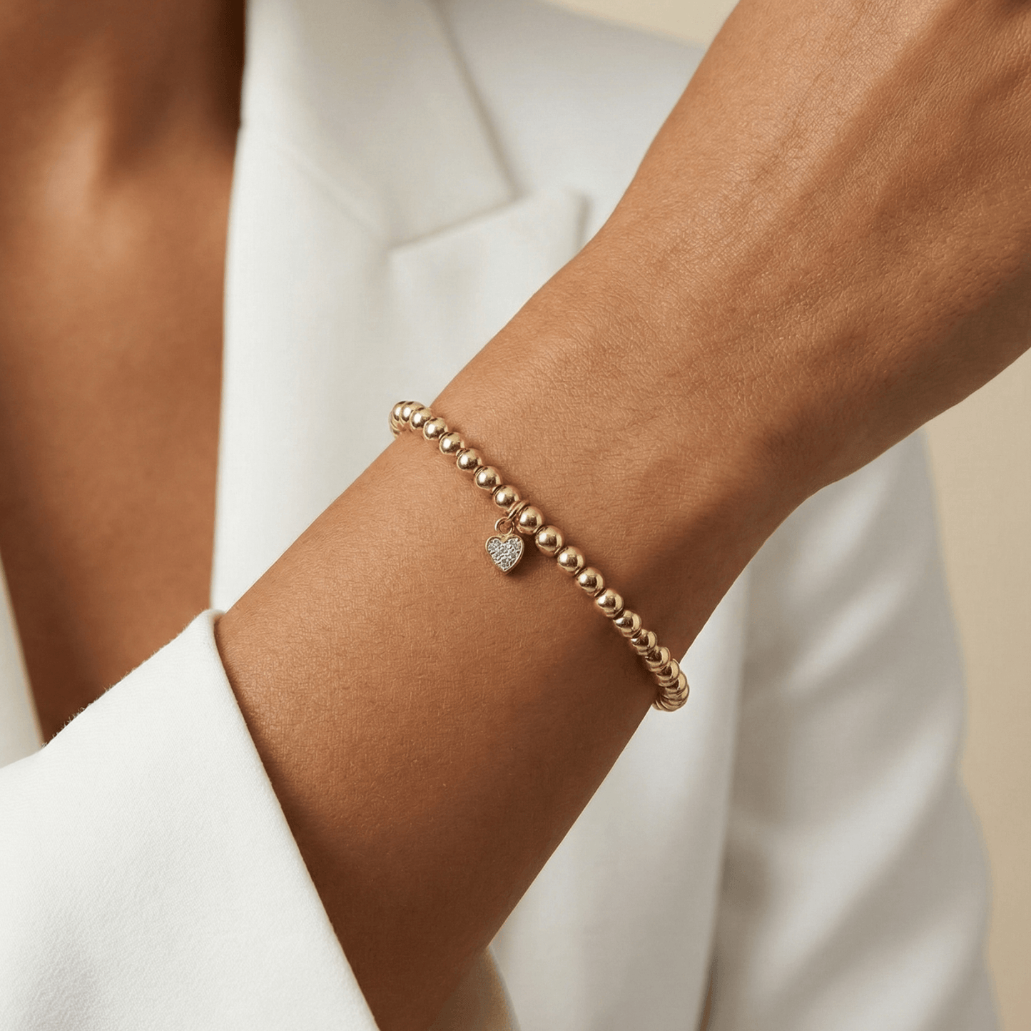 Waterproof heart charm gold bead bracelet with crystal detail – MXW Jewellery