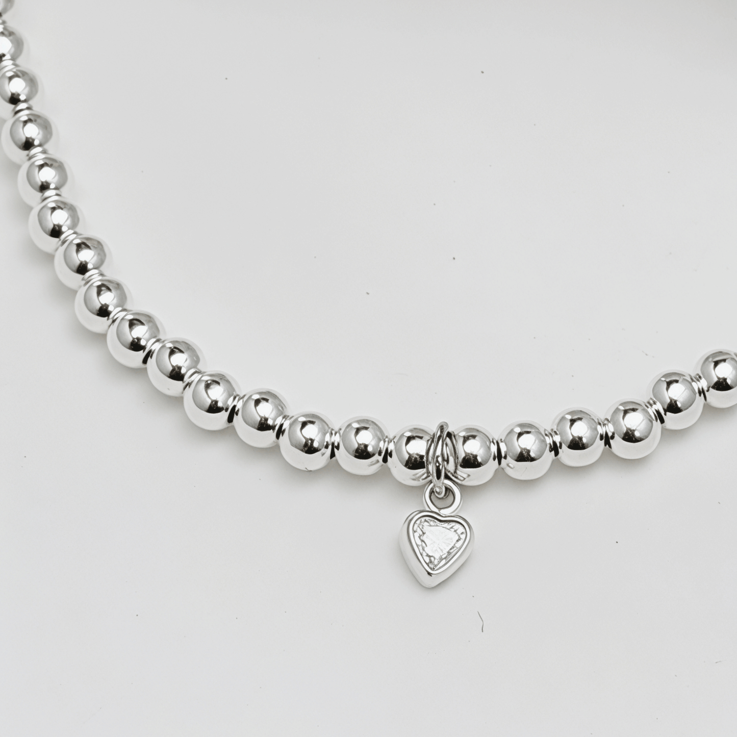 Heart charm sterling silver bead bracelet with crystal detail and polished silver beads – MXW Jewellery