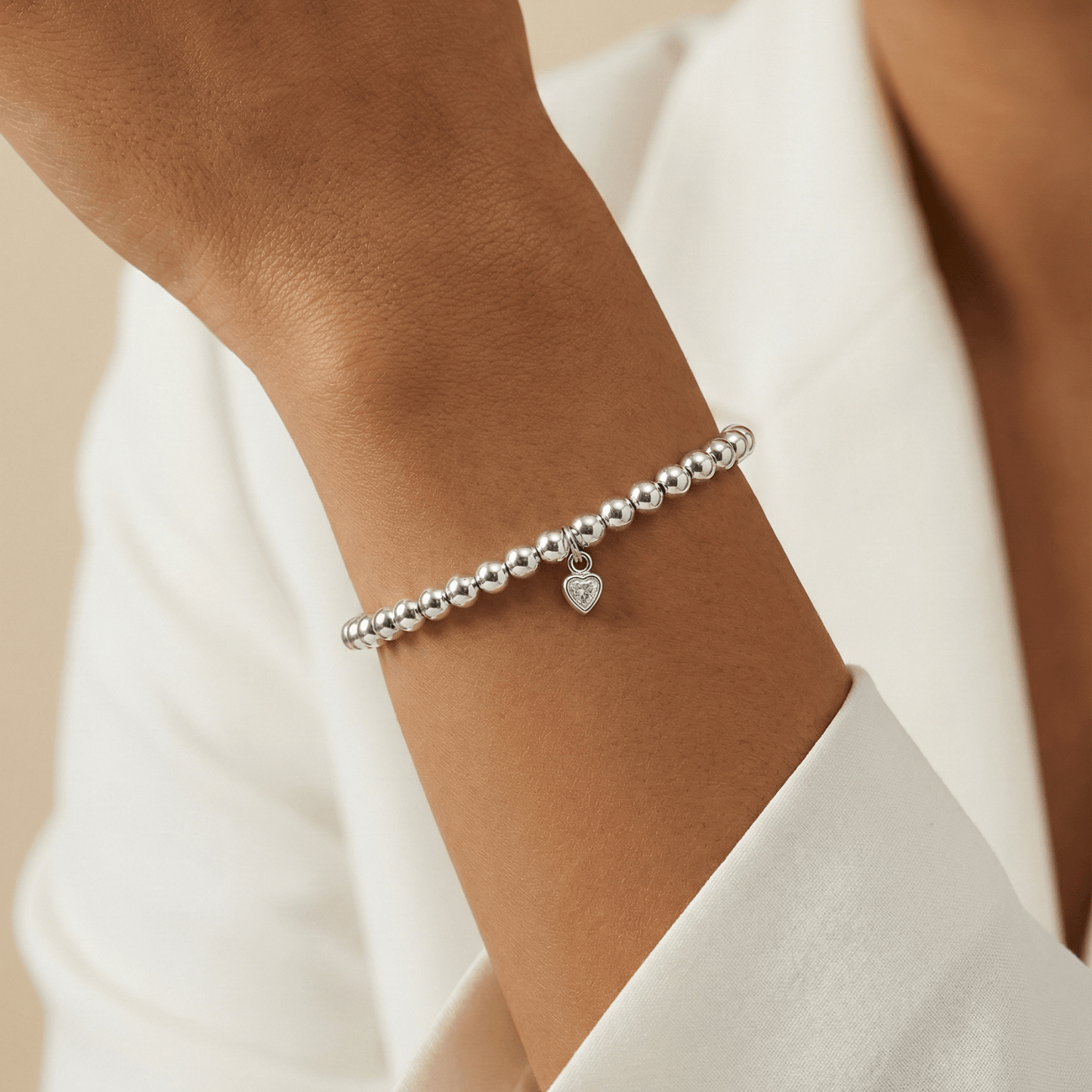 Heart charm sterling silver bead bracelet with crystal detail and polished silver beads – MXW Jewellery