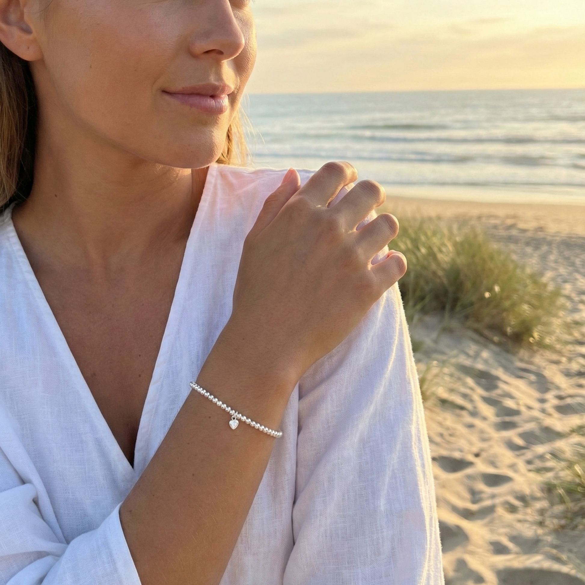 Heart charm sterling silver bead bracelet with crystal detail and polished silver beads – MXW Jewellery