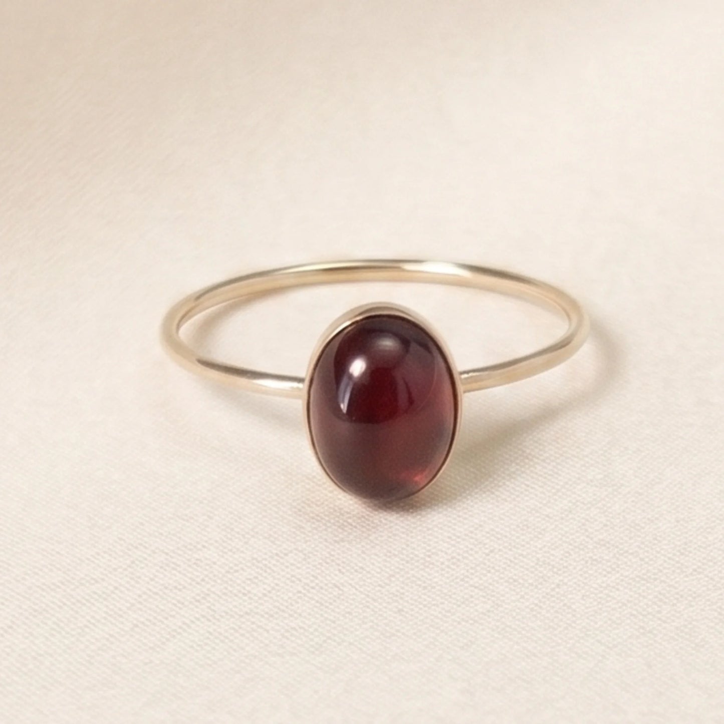 MXW natural oval garnet January birthstone stacking ring in 14K gold-filled metal