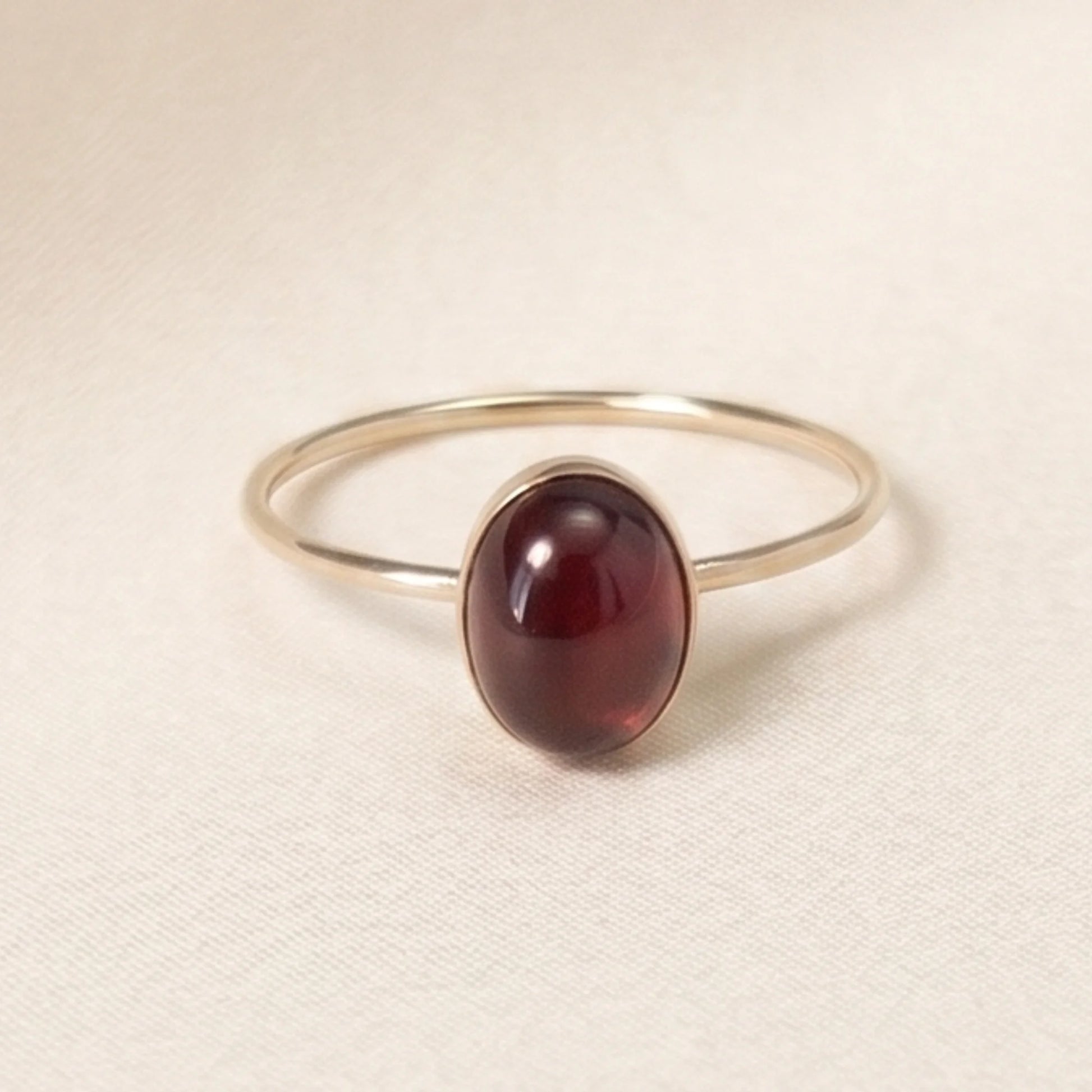 MXW natural oval garnet January birthstone stacking ring in 14K gold-filled metal