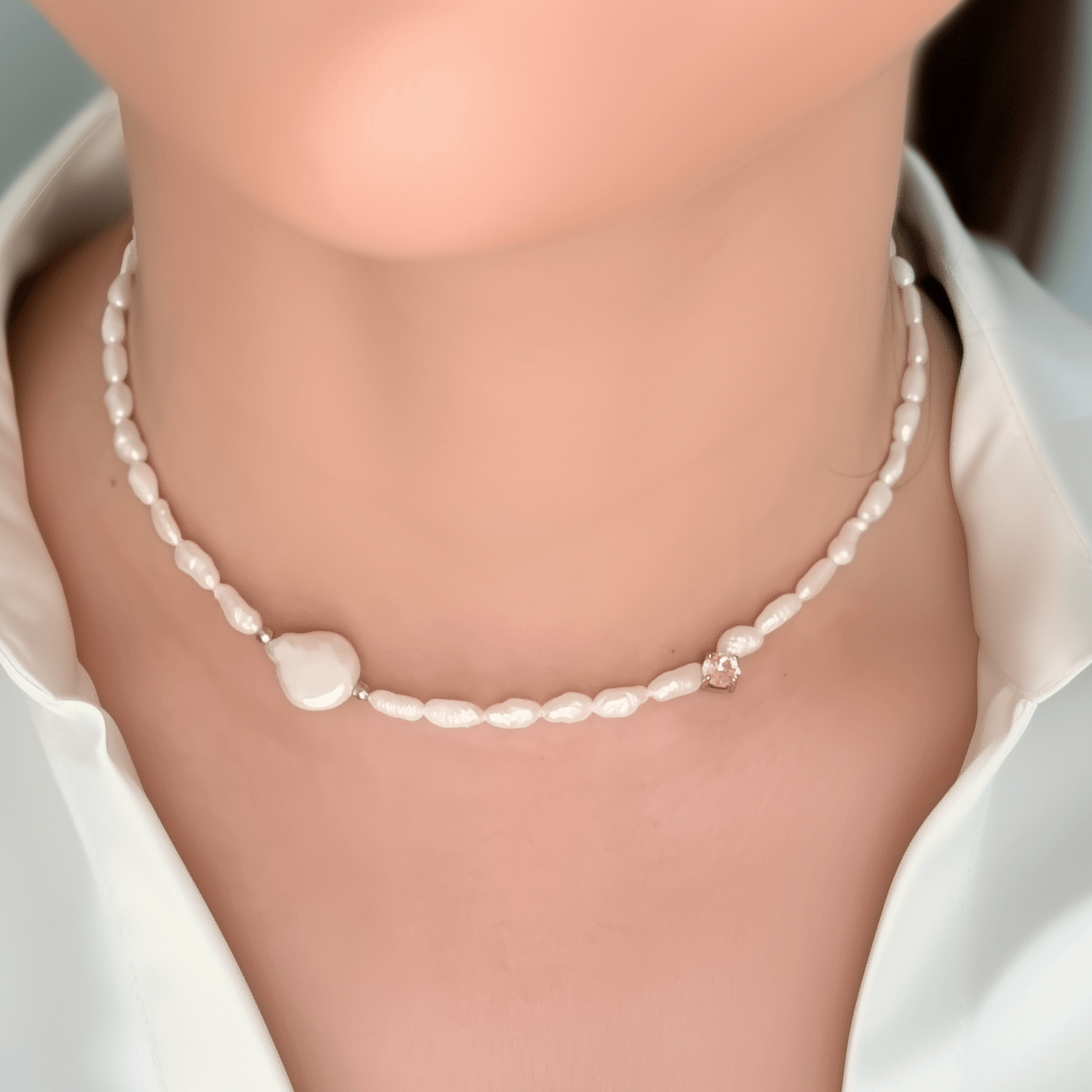 Handmade necklace with Keshi and baroque pearls, accented by a Swarovski crystal element in a birthstone-inspired color, with gold or silver findings.
