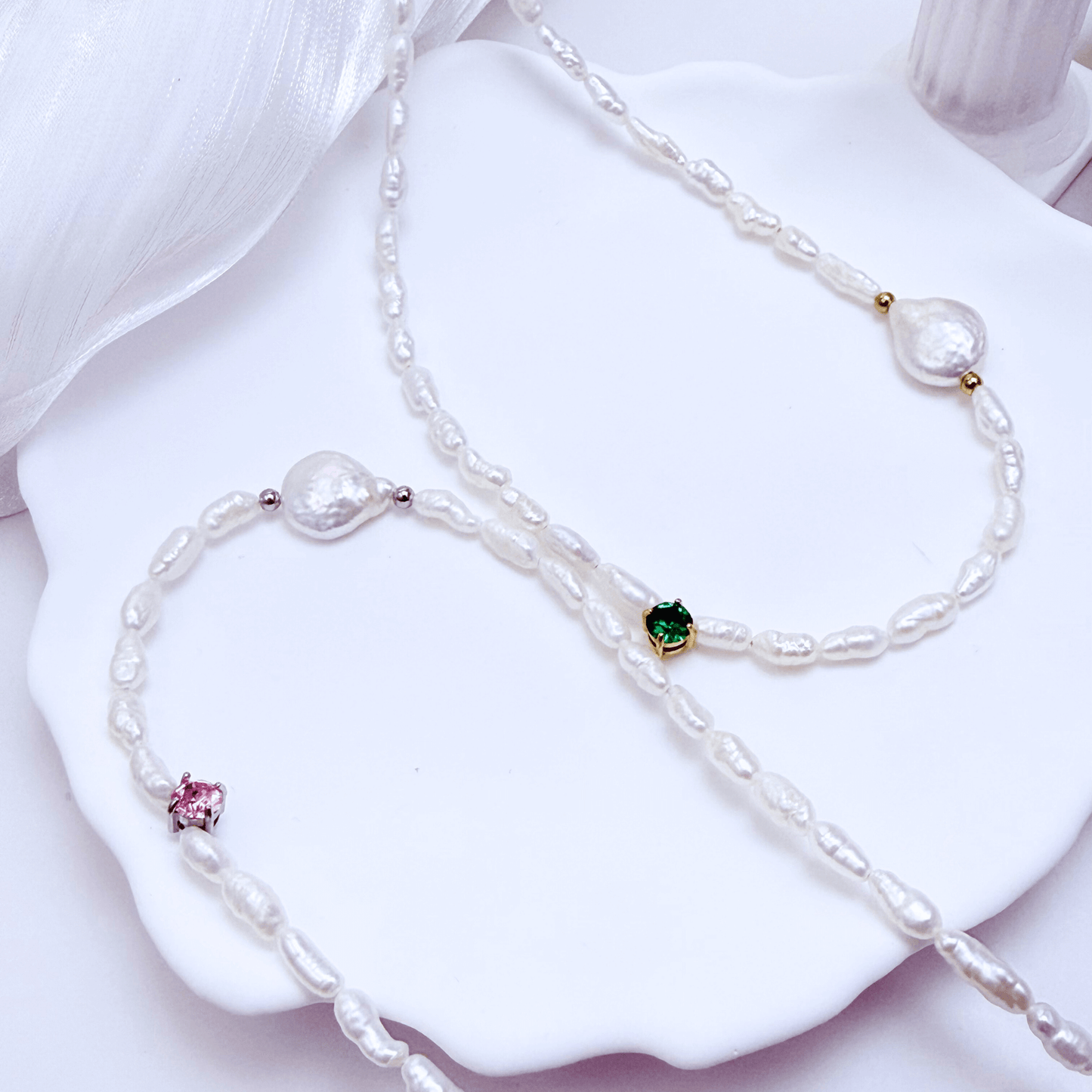 Handmade necklace with Keshi and baroque pearls, accented by a Swarovski crystal element in a birthstone-inspired color, with gold or silver findings.