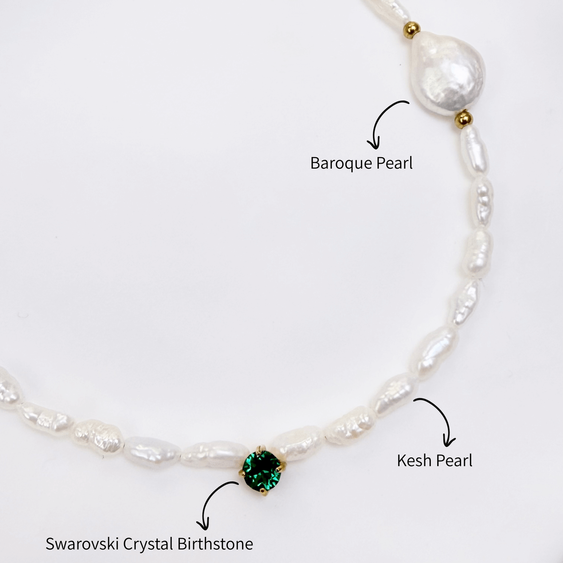 Handmade necklace with Keshi and baroque pearls, accented by a Swarovski crystal element in a birthstone-inspired color, with gold or silver findings.