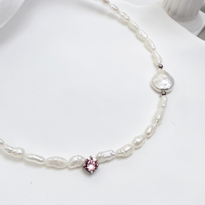 Handmade necklace with Keshi and baroque pearls, accented by a Swarovski crystal element in a birthstone-inspired color, with gold or silver findings.