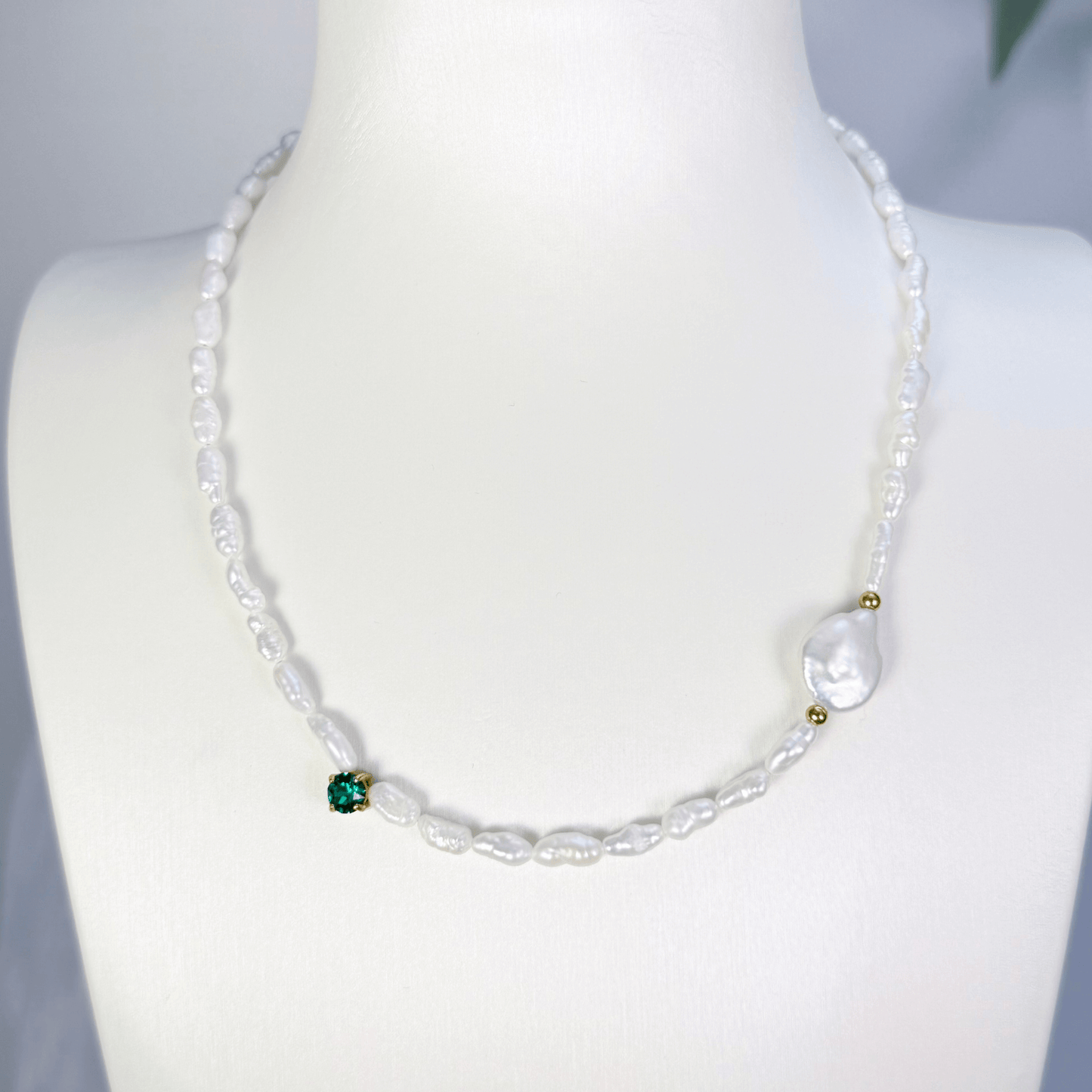 Handmade necklace with Keshi and baroque pearls, accented by a Swarovski crystal element in a birthstone-inspired color, with gold or silver findings.