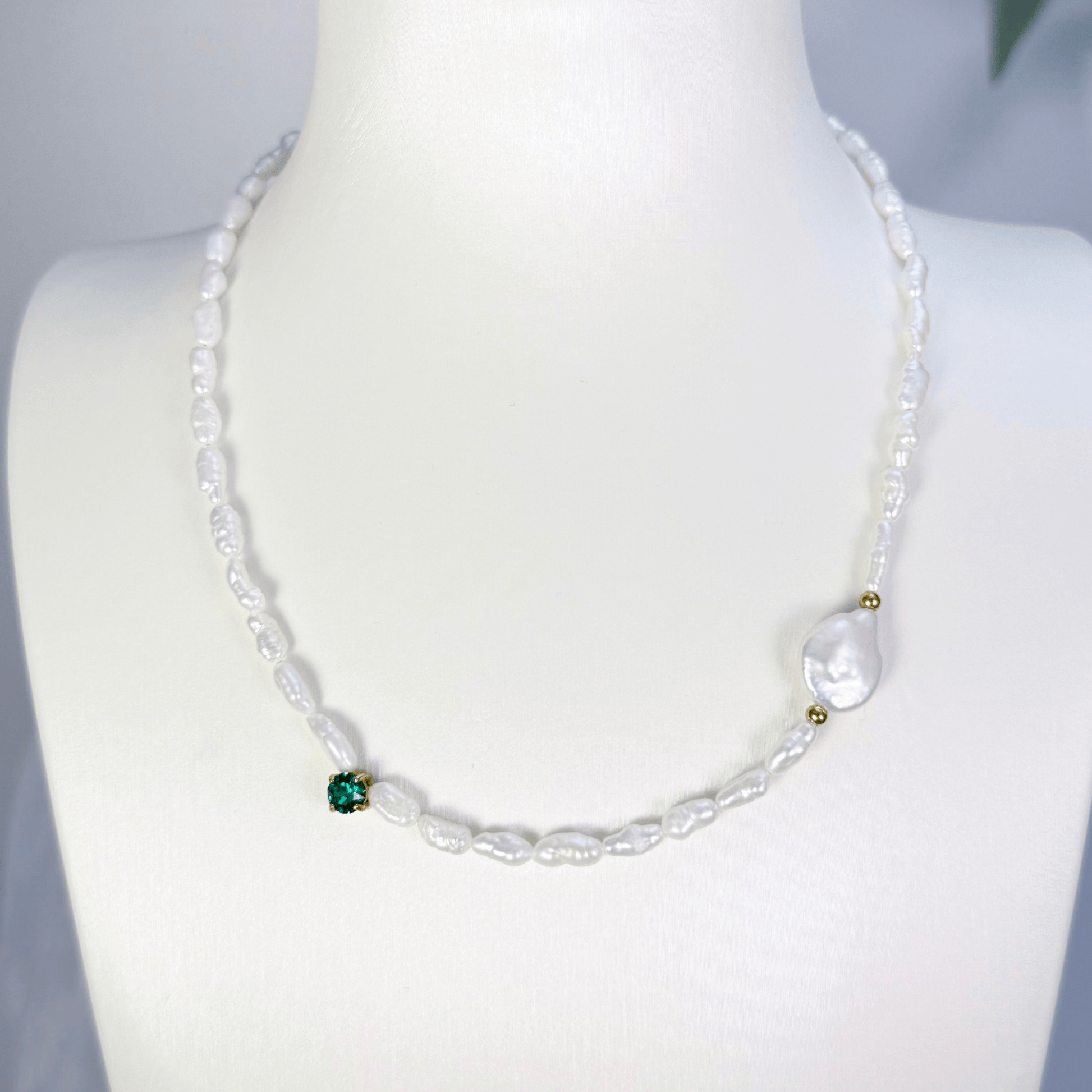 Handmade necklace with Keshi and baroque pearls, accented by a Swarovski crystal element in a birthstone-inspired color, with gold or silver findings.