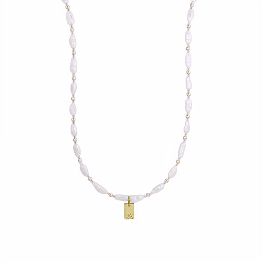 Keshi freshwater pearl and 14K gold filled beaded necklace with Swarovski crystal accents and personalised gold initial tag, hand-finished in Australia