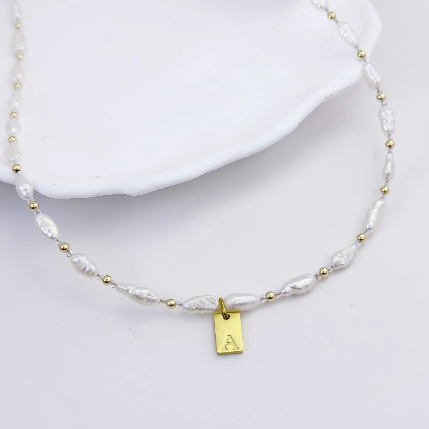 Keshi freshwater pearl and 14K gold filled beaded necklace with Swarovski crystal accents and personalised gold initial tag, hand-finished in Australia