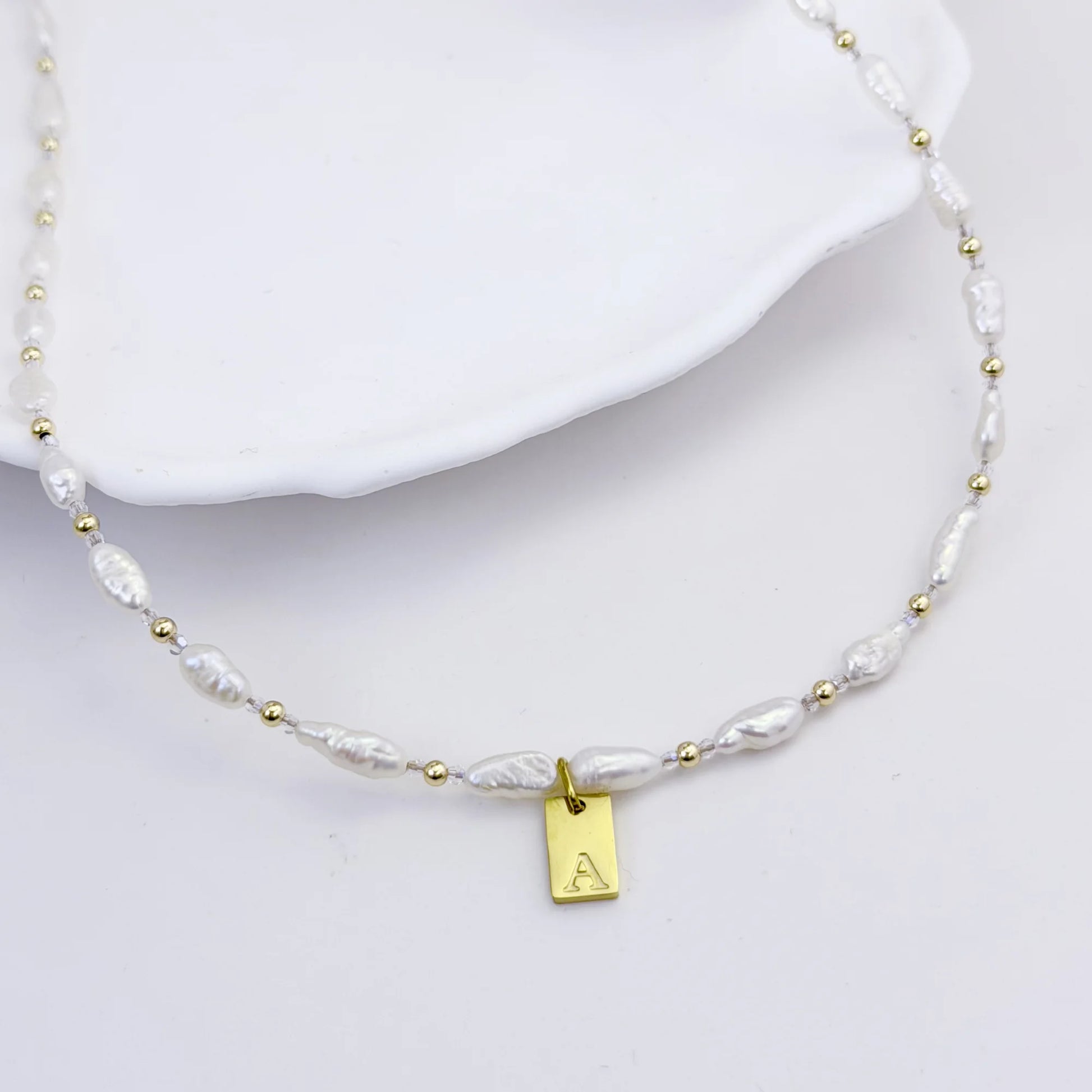 Keshi freshwater pearl and 14K gold filled beaded necklace with Swarovski crystal accents and personalised gold initial tag, hand-finished in Australia