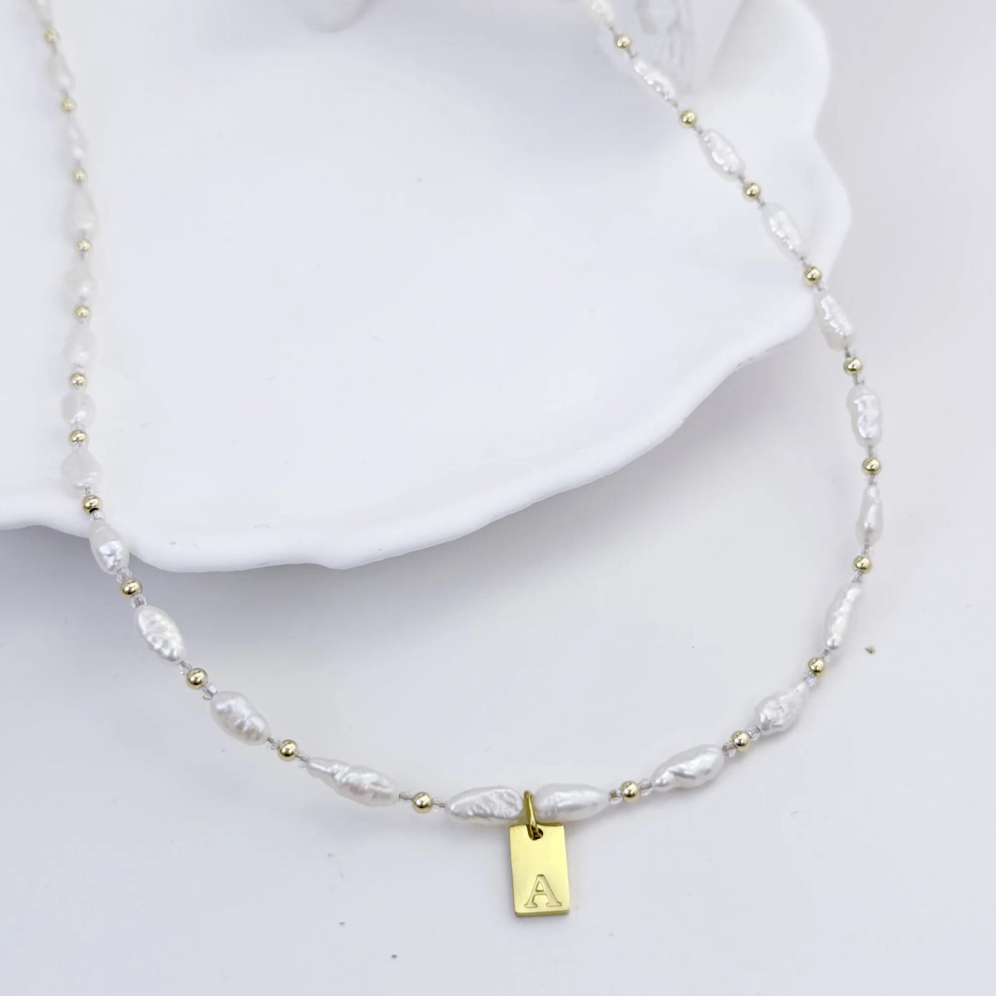 Keshi freshwater pearl and 14K gold filled beaded necklace with Swarovski crystal accents and personalised gold initial tag, hand-finished in Australia