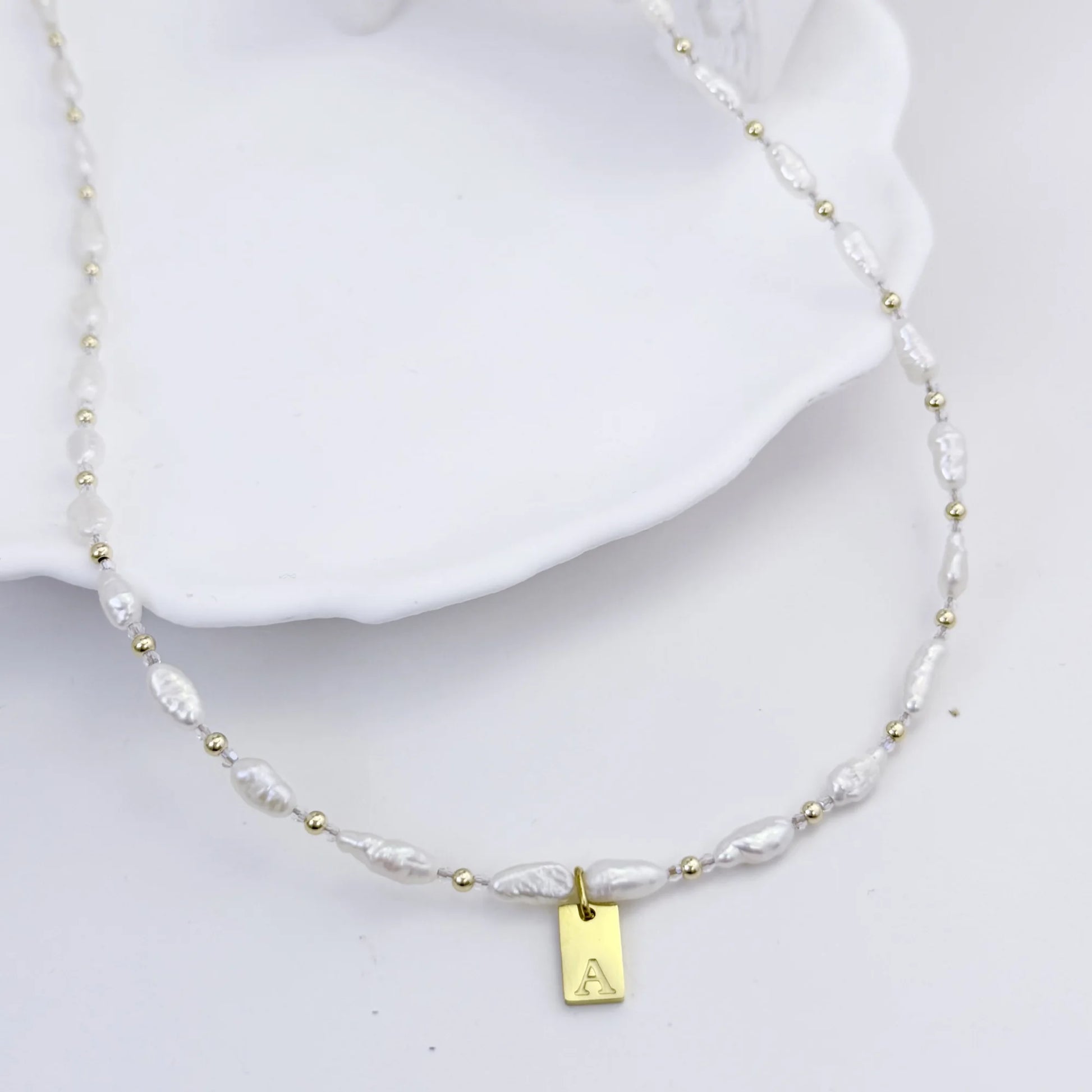 Keshi freshwater pearl and 14K gold filled beaded necklace with Swarovski crystal accents and personalised gold initial tag, hand-finished in Australia