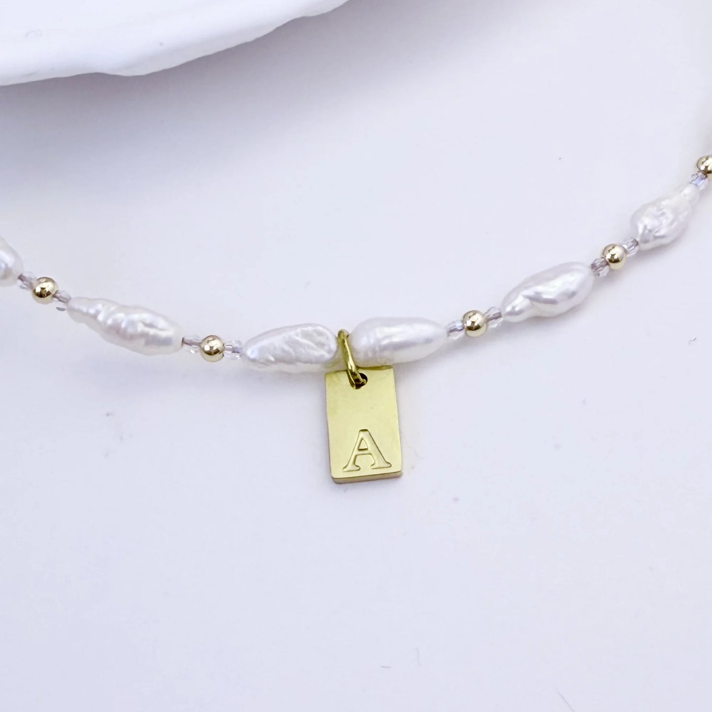 Keshi freshwater pearl and 14K gold filled beaded necklace with Swarovski crystal accents and personalised gold initial tag, hand-finished in Australia