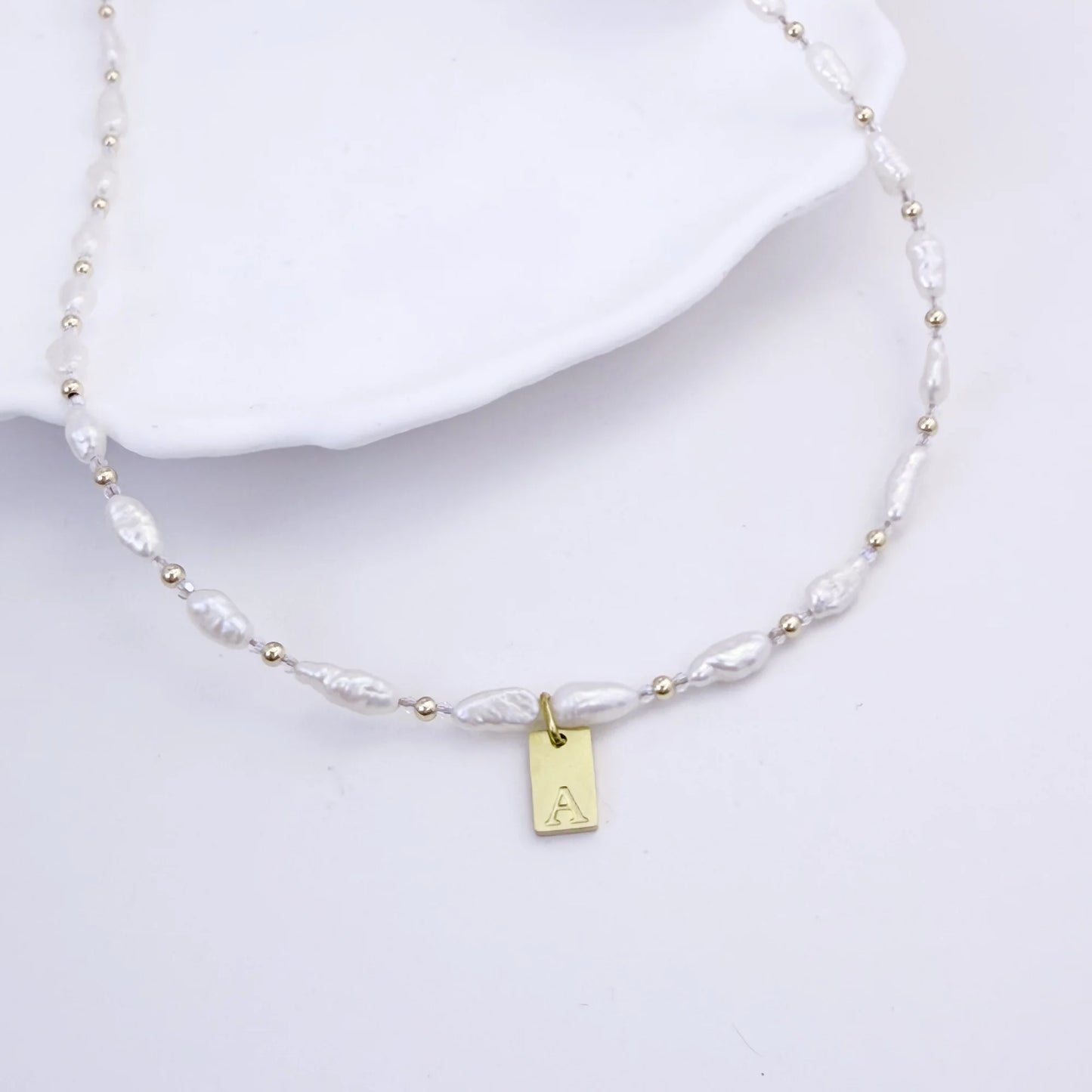 Keshi freshwater pearl and 14K gold filled beaded necklace with Swarovski crystal accents and personalised gold initial tag, hand-finished in Australia