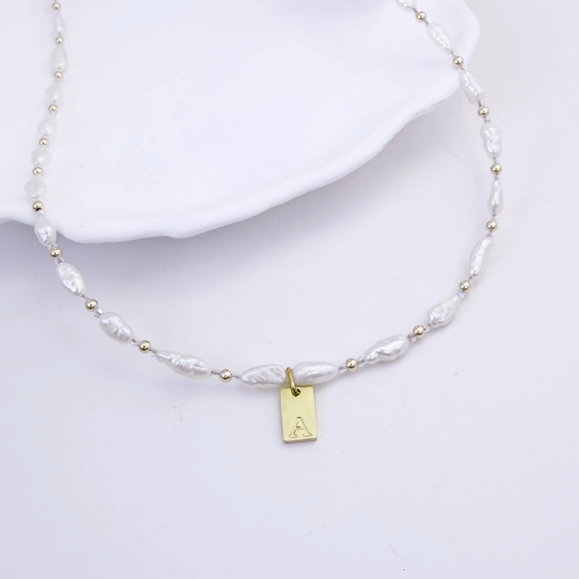 Keshi freshwater pearl and 14K gold filled beaded necklace with Swarovski crystal accents and personalised gold initial tag, hand-finished in Australia
