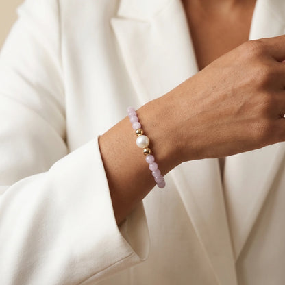 Kunzite, pearl and initial gold bracelet featuring translucent violet kunzite beads, lustrous freshwater pearls and a personalised gold-filled stamped initial disc.
