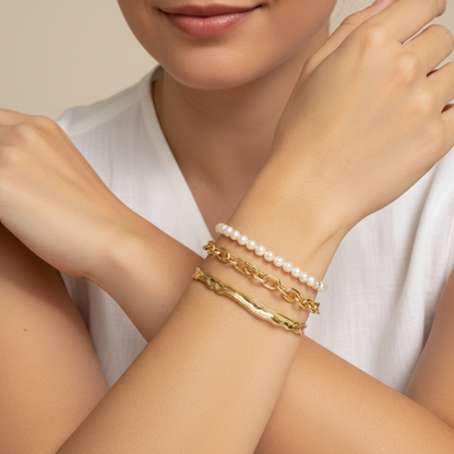 Gold textured cuff bracelet with molten, organic design.