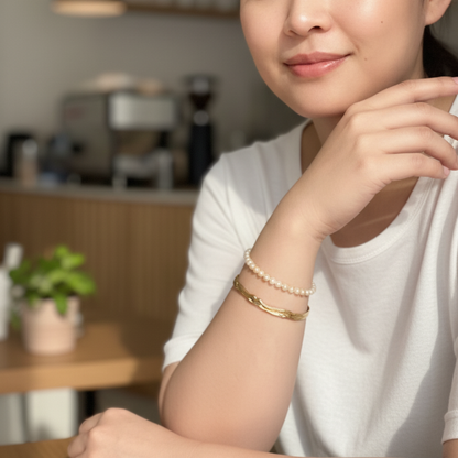 Gold textured cuff bracelet with molten, organic design.
