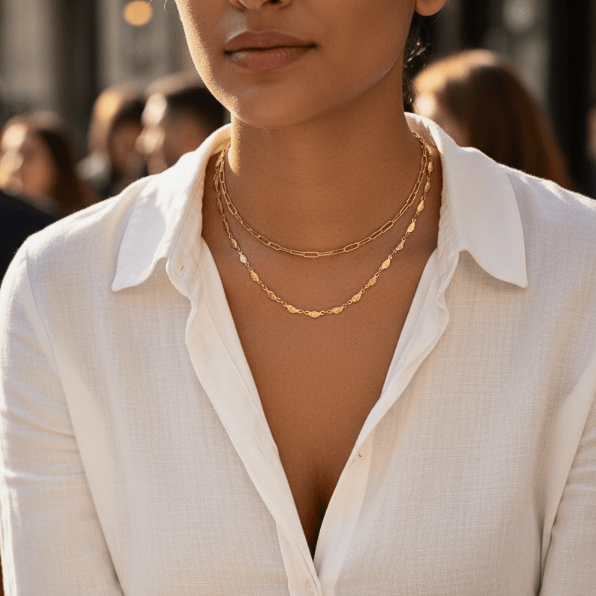 Elegant waterproof gold chain featuring textured leaf links with a minimalist, nature-inspired design